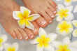 ist1_3282330-frangipani-therapy-feet