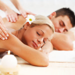 Beautiful couple enjoying in the back massage.