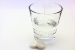 glass of drinking water offered after hopi ear treatment