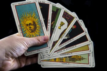 tarot cards in a hand